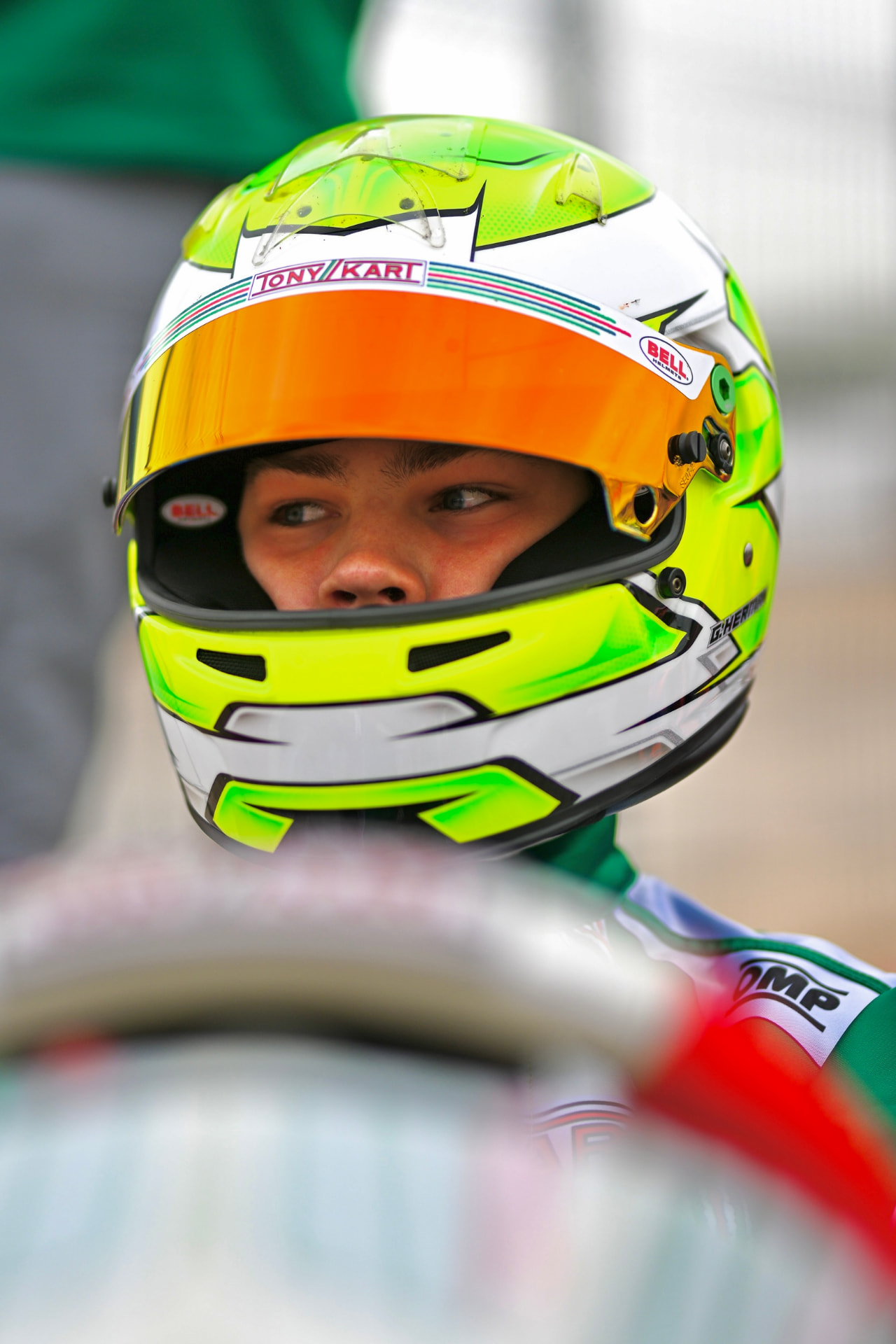 Gilles wearing his green and white helmet